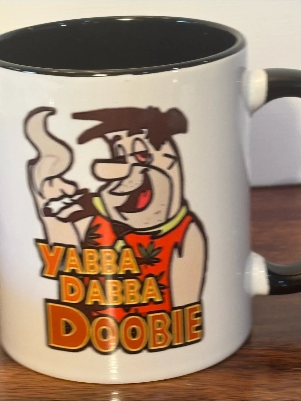 Novelty White Ceramic Coffee Mug with Black Handle - Yabba Dabba Doobie Design